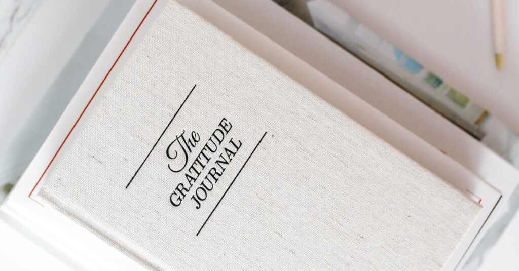 stacked journals diaries desk