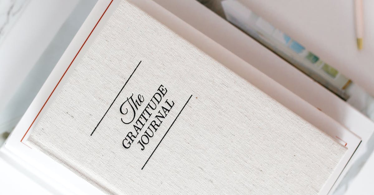 stacked journals diaries desk