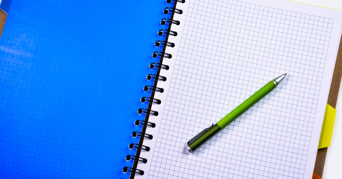 grid paper notebook stack