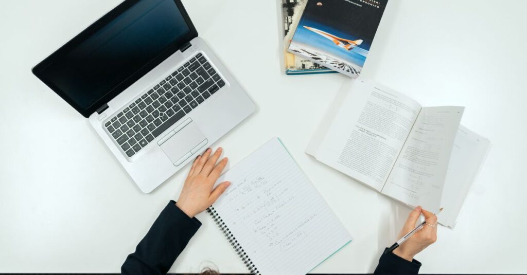open science notebook with pen