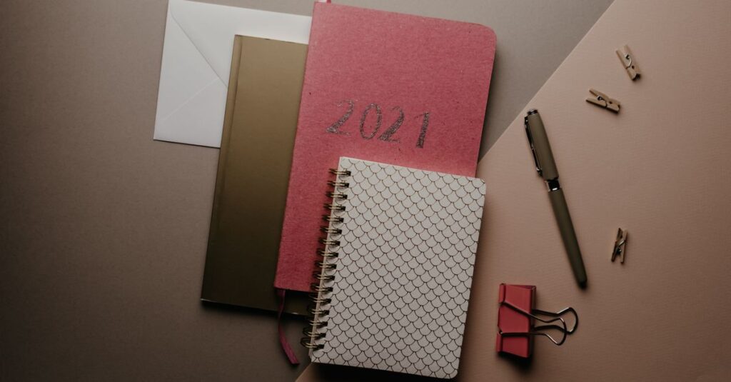 stack of spiral notebooks