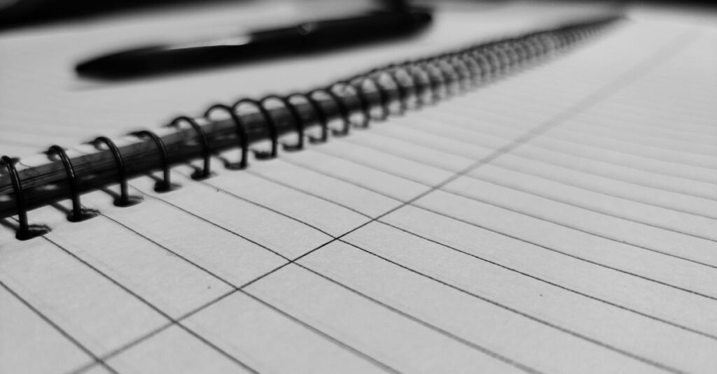 spiral notebook on desk