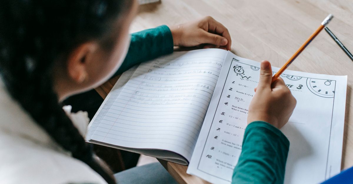 student notebook writing desk