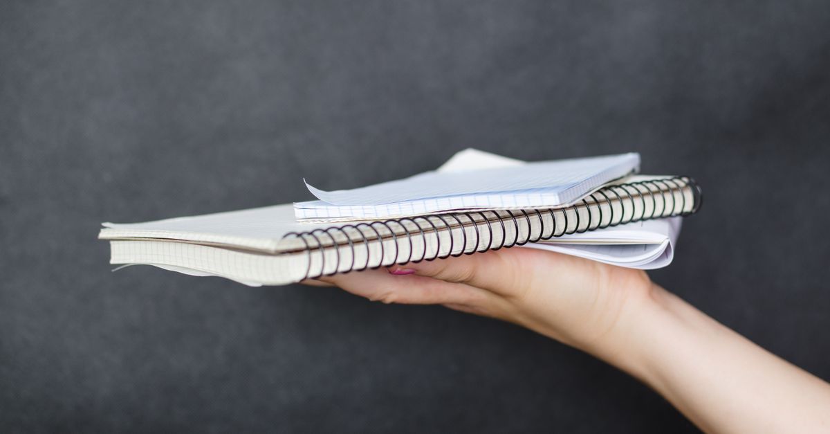 stack of spiral notebooks