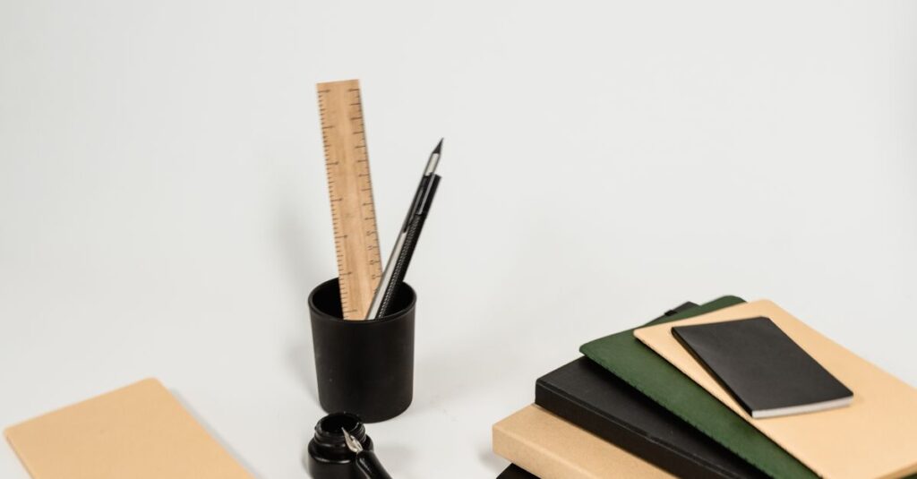 thick notebook with pen