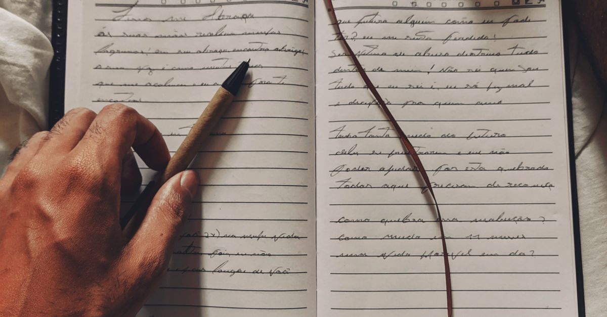 diary with pen writing