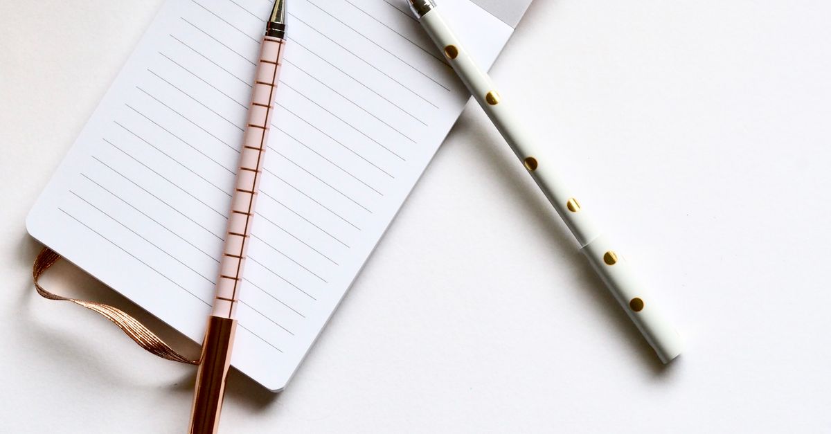 open notebook with pen