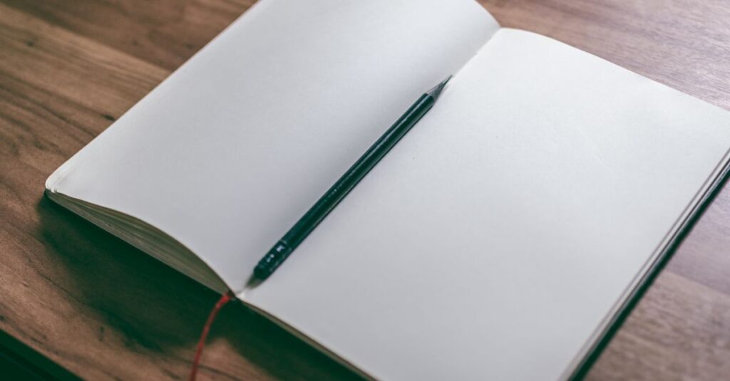 blank notebook open on desk