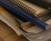 stack of notebooks desk