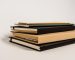 stack of 300 page notebooks